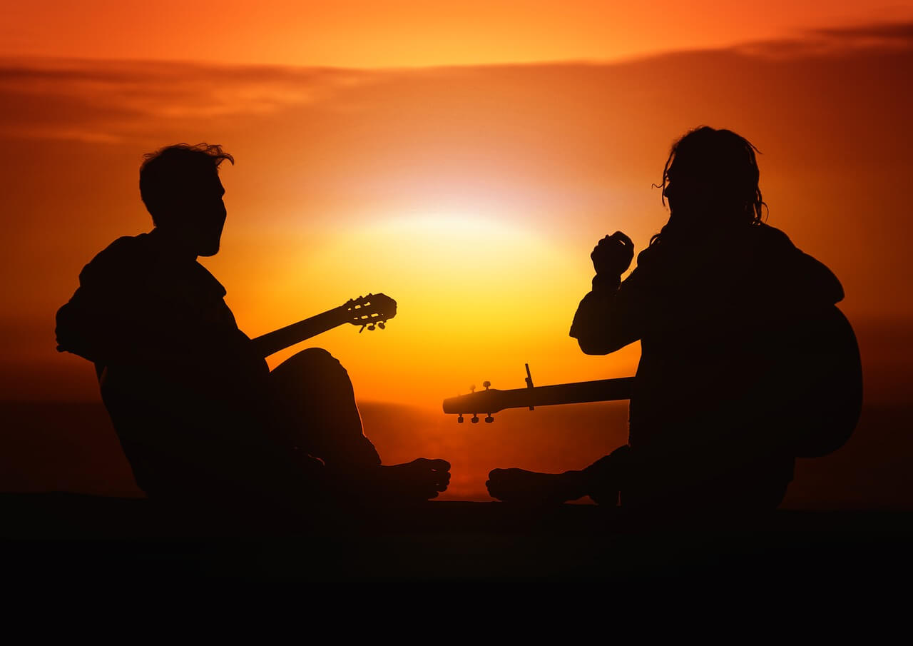 musicians in sunset